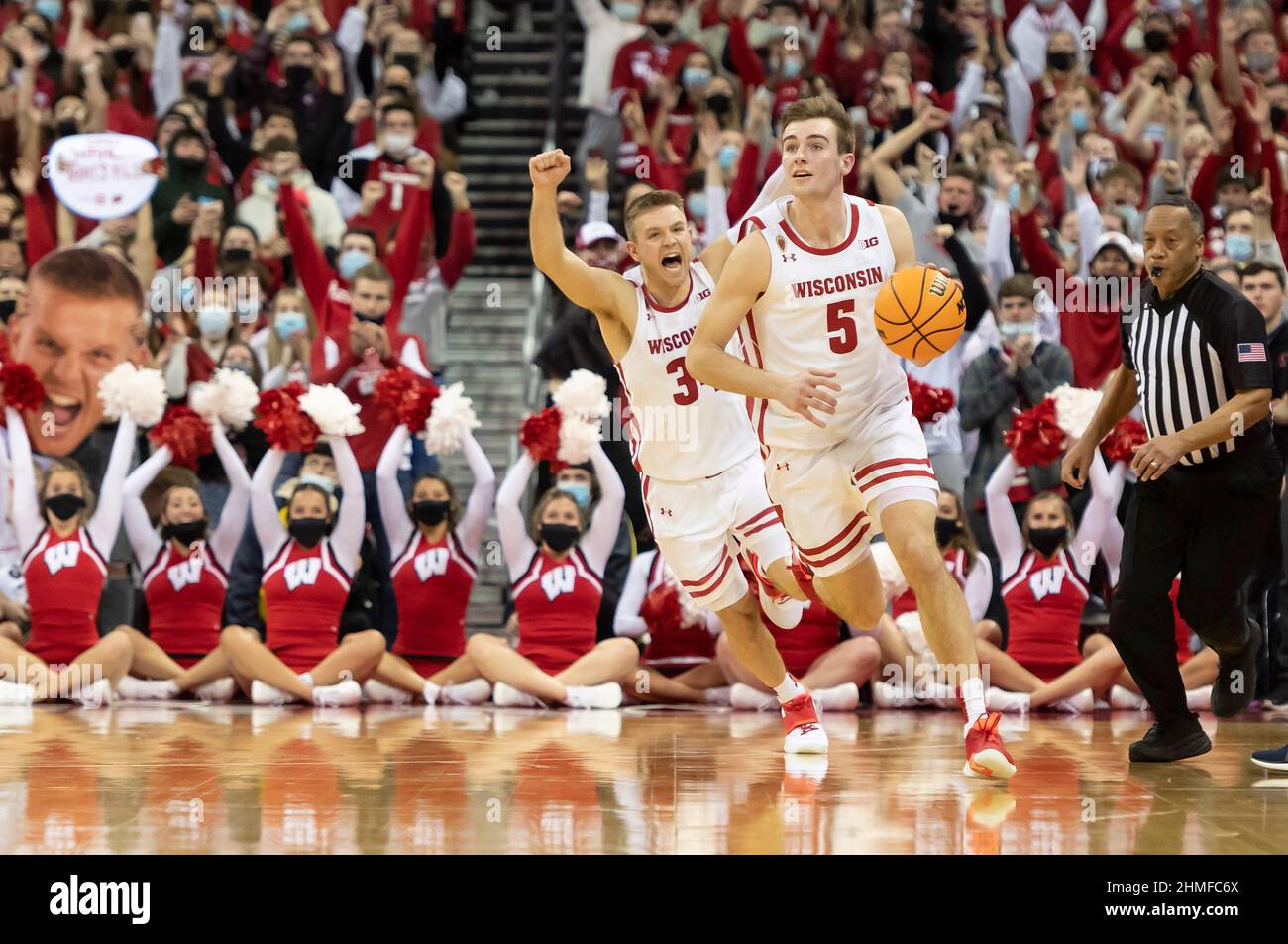 Madison, WI, USA. 5th Feb, 2022. Wisconsin Badgers forward Tyler Wahl #5 rebounds the ball with time running out and Wisconsin Badgers guard Brad Davison #34 celebrates during NCAA basketball game between the Penn State Nittany Lions and the Wisconsin Badgers at Kohl Center in Madison, WI. Wisconsin defeated Penn State 51-49. Kirsten Schmitt/CSM/Alamy Live News Stock Photo