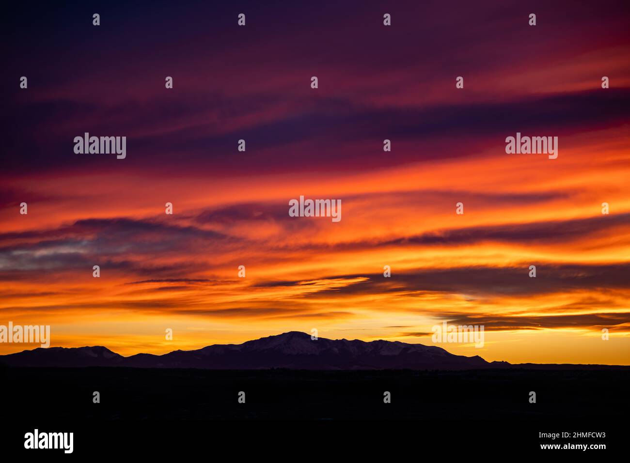 Colorado Sunset with Mountain Silhouette Stock Photo