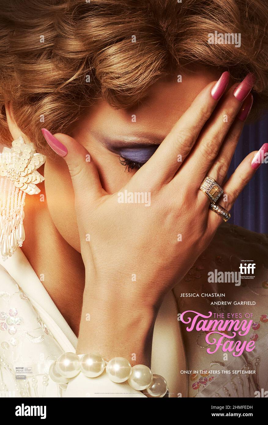 The Eyes of Tammy Faye (2021) directed by Michael Showalter and starring Jessica Chastain, Andrew Garfield and Cherry Jones. An intimate look at the extraordinary rise, fall and redemption of televangelist Tammy Faye Bakker. Stock Photo