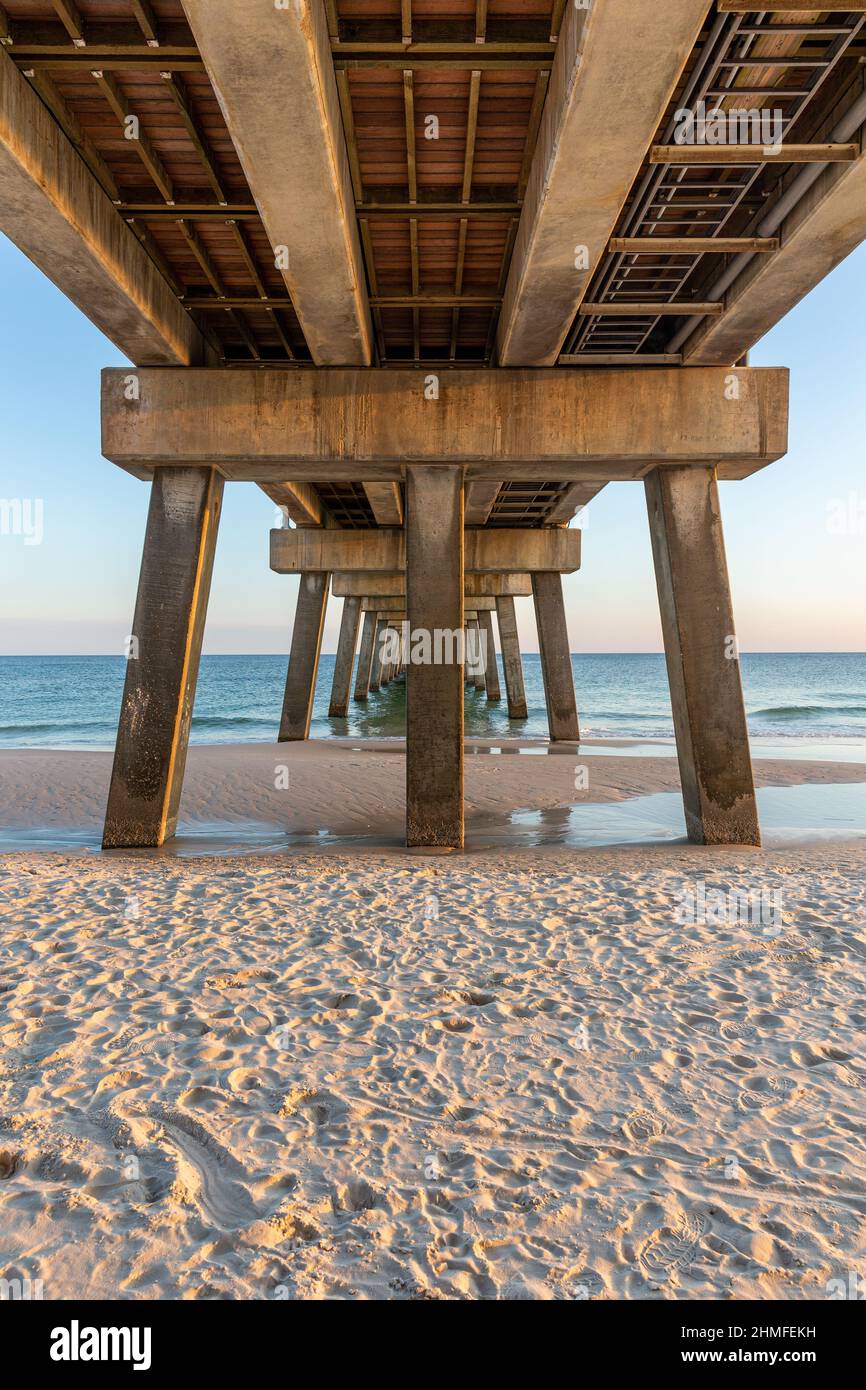 Boardwalk at Gulf Shores, Orange Beach, Alabama.  Viewed from below and in warm late or early day light. Stock Photo