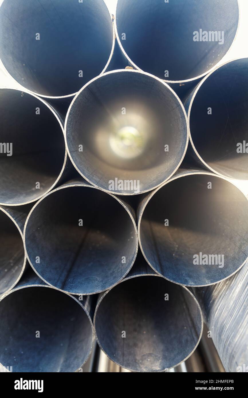 metal pipes on stack, close up Stock Photo - Alamy