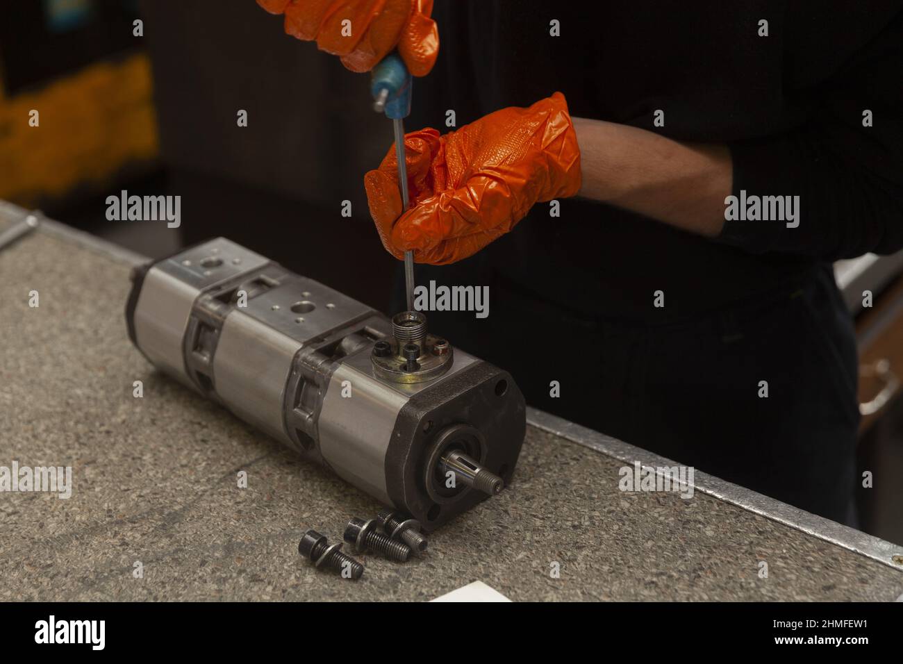 servicing a gear hydraulic pump on table Stock Photo Alamy