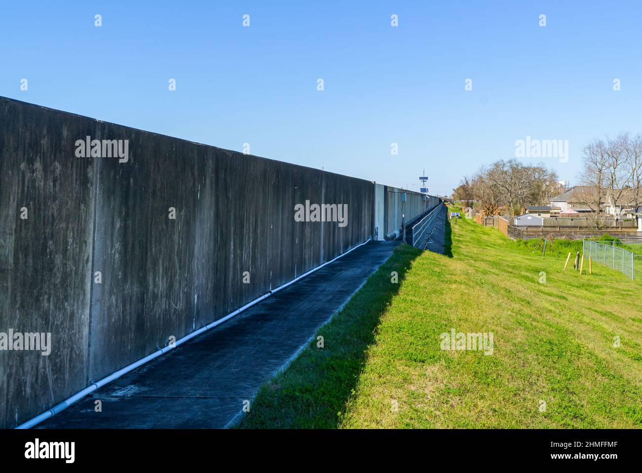 NEW ORLEANS, LA, USA - MARCH 3, 2021: Levee Flood Wall on London Avenue Canal in Gentilly Neighborhood Stock Photo