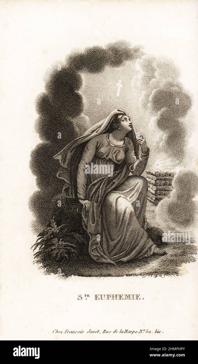 Saint Euphemia, the All-praised, martyred 307 AD. Sainte-Euphemie, Christian virgin martyr saint. Tortured and then thrown to wild animals in an arena at Chalcedon. Depicted with a flaming pyre. Copperplate stipple engraving from Mr. M. E’s Les Jeunes Martyres de la Foi Chretienne, Young Martyrs of the Christian Faith, Francois Janet, Paris, 1819. Stock Photo