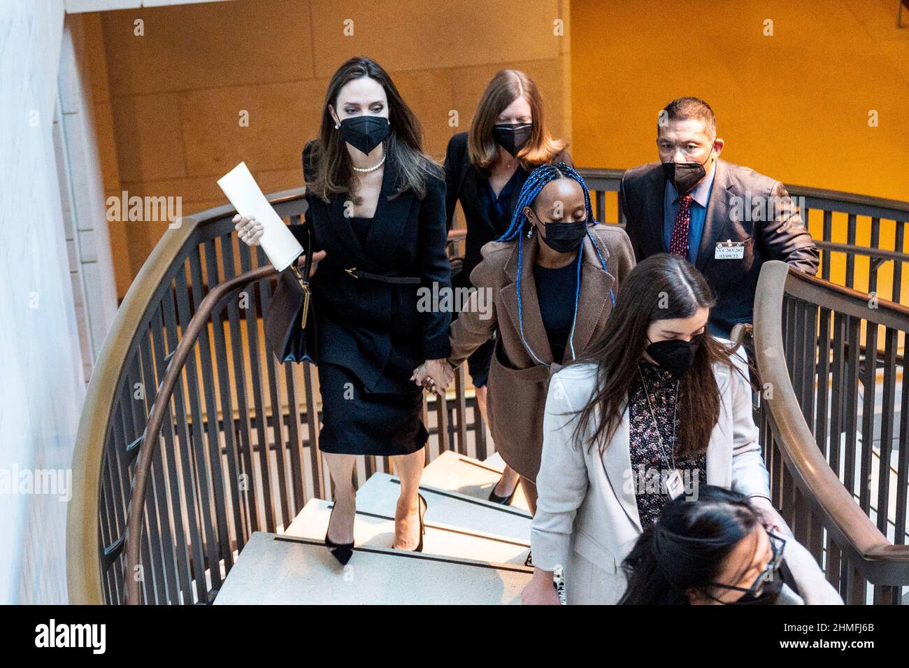 Washington, DC, USA. 9th Feb, 2022. February 9, 2022 - Washington, DC, United States: ANGELINA JOLIE holding hands with her daughter, ZAHARA MARLEY JOLIE-PITT, leaving a press conference about a bipartisan modernized Violence Against Women Act (Credit Image: © Michael Brochstein/ZUMA Press Wire) Stock Photo