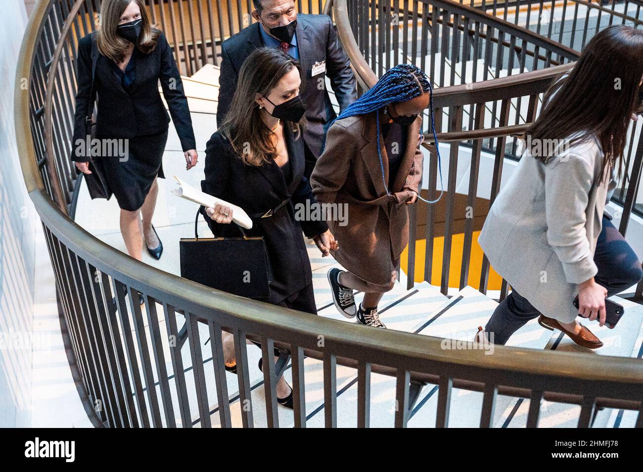 Washington, DC, USA. 9th Feb, 2022. February 9, 2022 - Washington, DC, United States: ANGELINA JOLIE holding hands with her daughter, ZAHARA MARLEY JOLIE-PITT, leaving a press conference about a bipartisan modernized Violence Against Women Act (Credit Image: © Michael Brochstein/ZUMA Press Wire) Stock Photo
