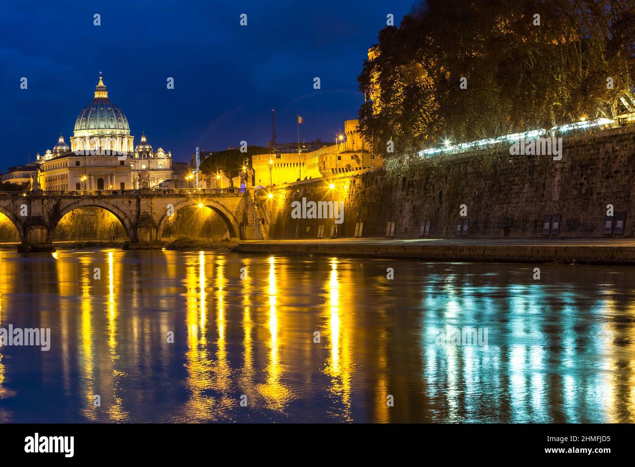 Angelo Bridge and St. Peter's Basilica at dusk, Rome, Italy Stock Photo