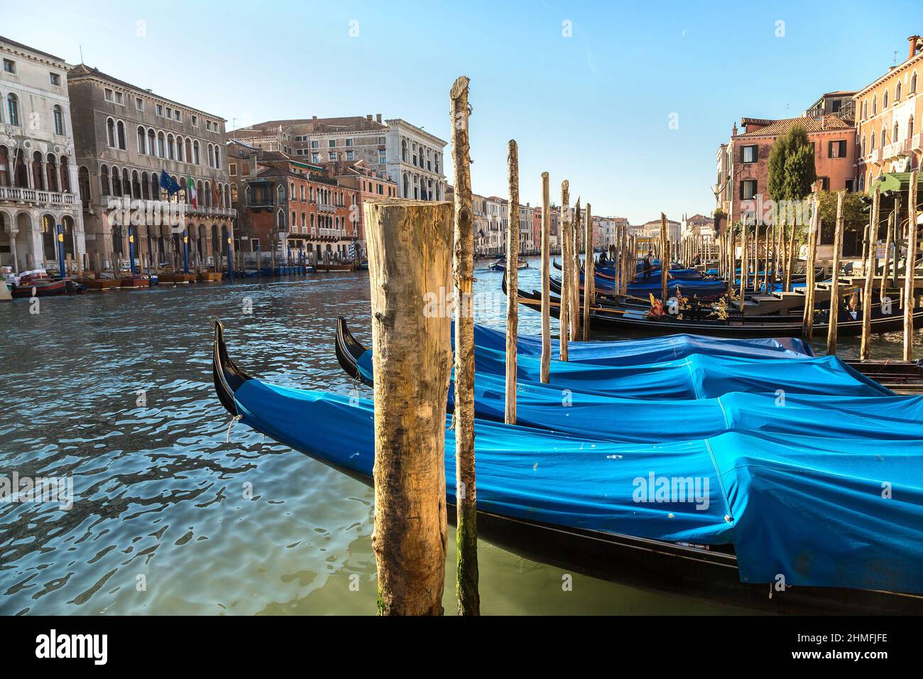Gondola on Canal Grande in Venice, in a beautiful summer day in Italy Stock Photo