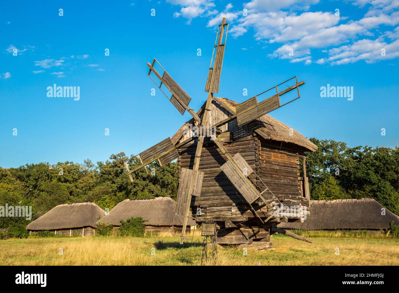 Traditional ukrainian windmill in the museum of national architecture in Pirogovo in a summer day, Kiev, Ukraine Stock Photo