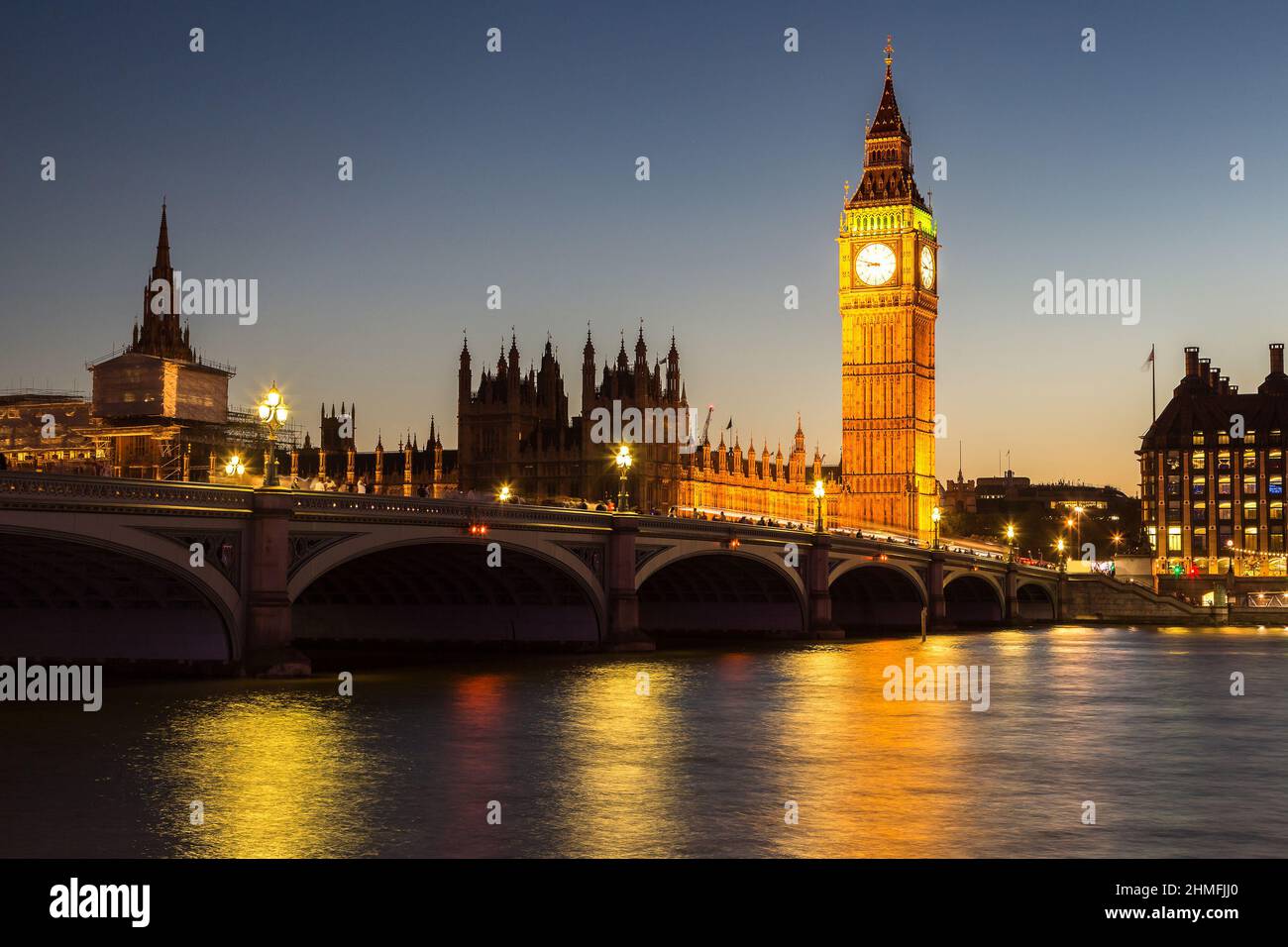 The Big Ben, the Houses of Parliament and Westminster bridge in London in a beautiful summer night, England, United Kingdom Stock Photo