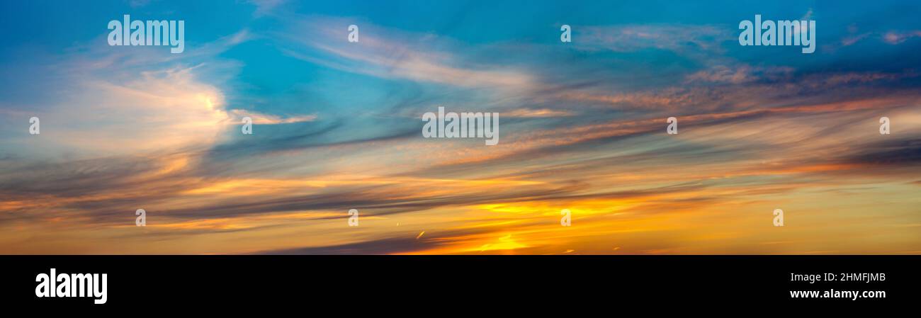 Colorful panorama sky during sunrise and sunset in a summer morning Stock Photo