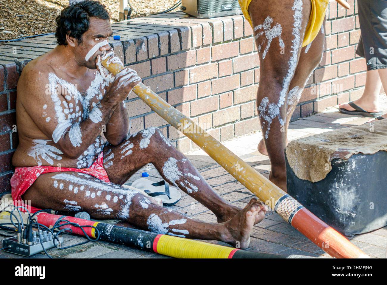 Sydney Australia,Circular Quay,aborigine aboriginal male man,playing didgeridoo body paint Stock Photo
