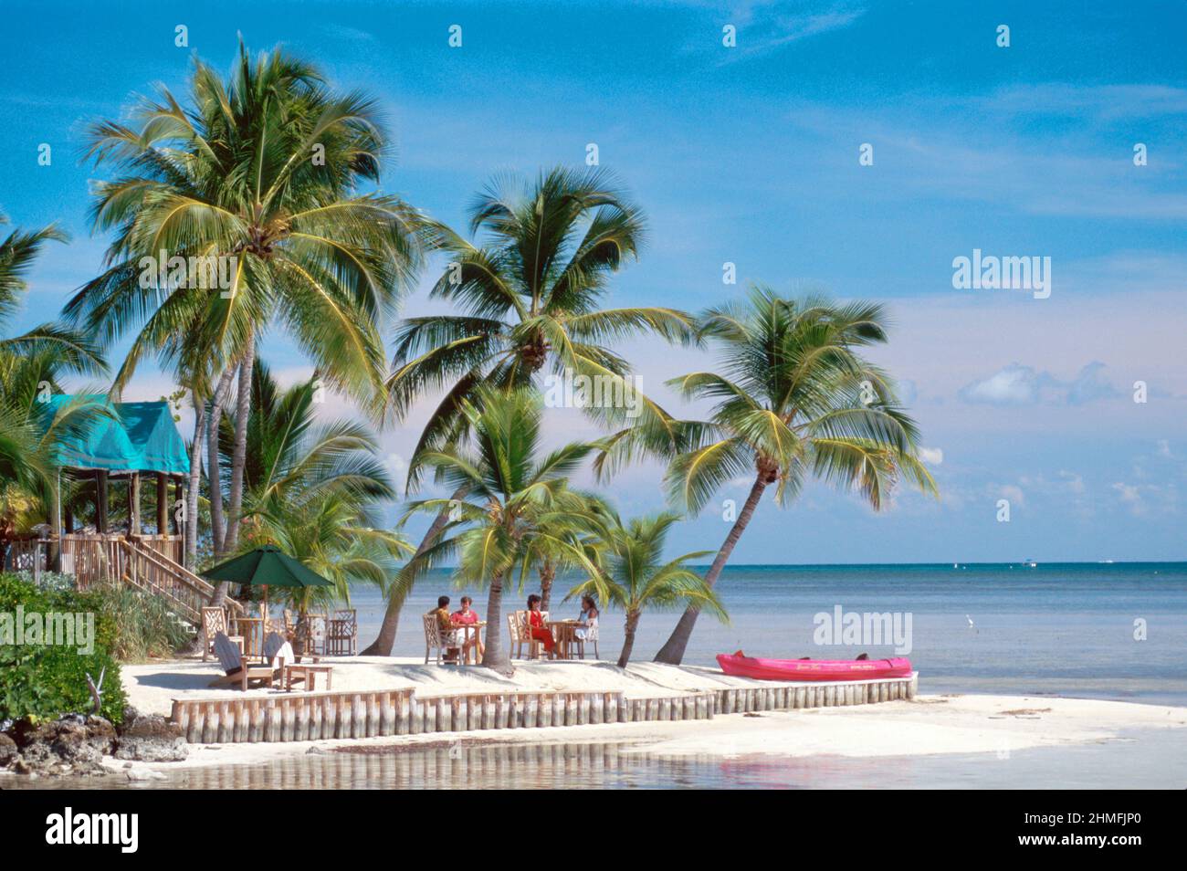 Florida Keys Little Torch Key,Little Palm Island Resort & Spa palm trees sand beach,Gulf of Mexico Atlantic Ocean Stock Photo