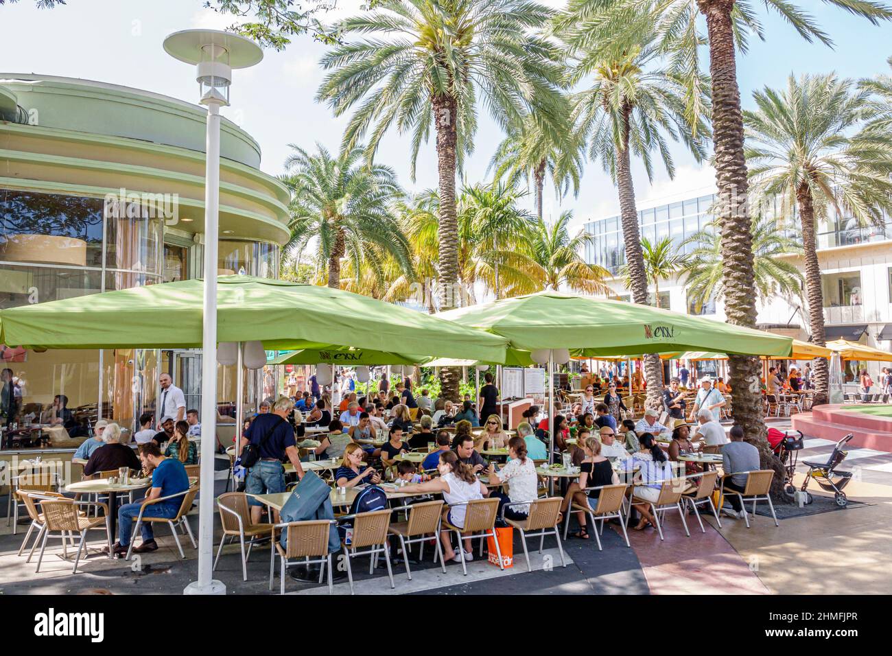 Miami Beach Florida,Lincoln Road,pedestrian mall,Nexxt Café restaurant outdoor dining al fresco umbrellas crowded Stock Photo