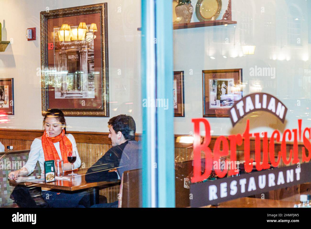 Alexandria Virginia,Old Town,King Street,Bertucci's Italian Restaurant,dining interior inside Asian woman man couple Stock Photo