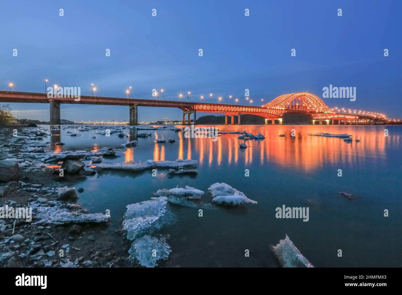 Winter landscape of blue ice and the banghwa river bridge, Shout Korea Stock Photo