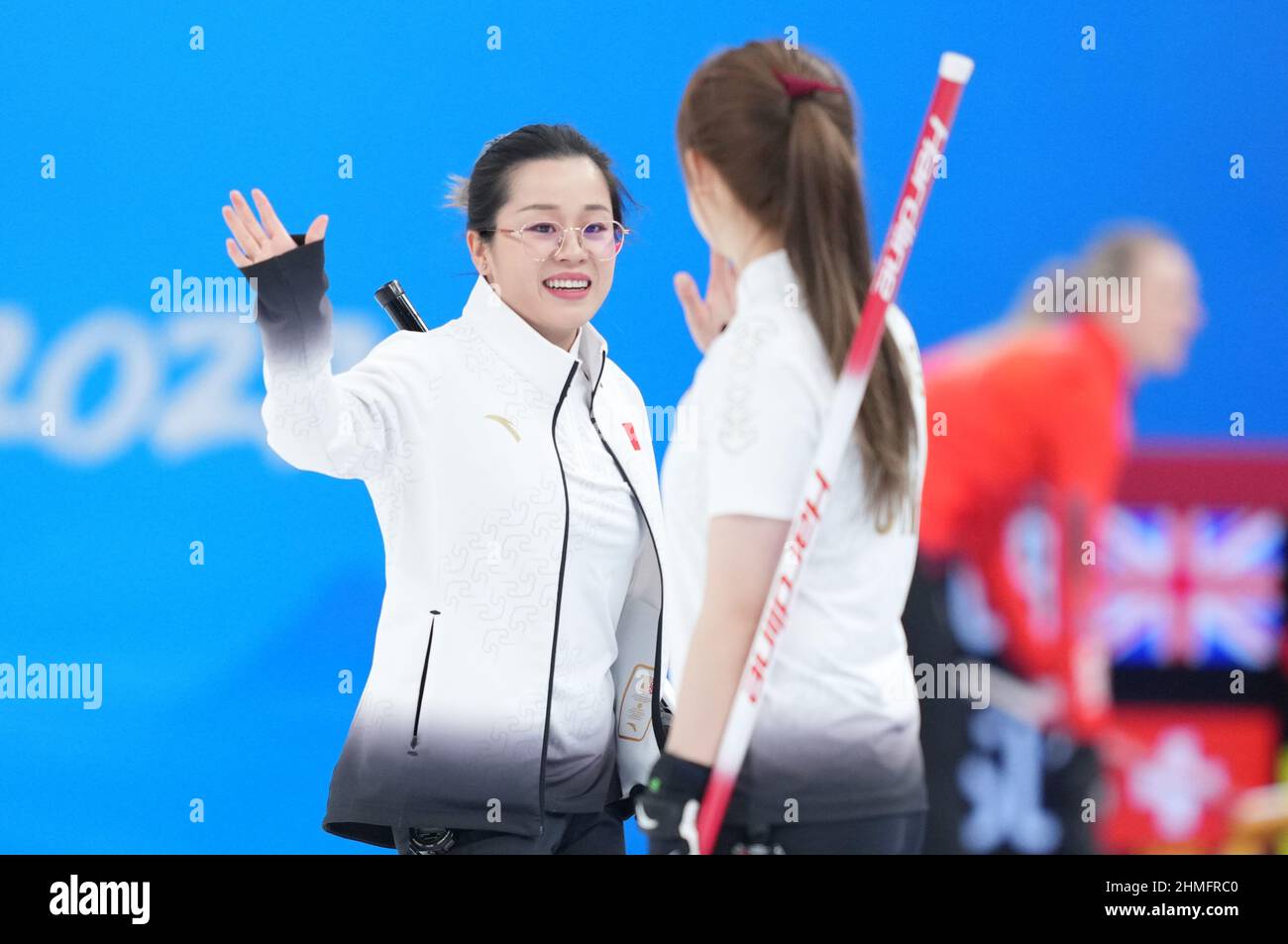 Beijing, China. 10th Feb, 2022. Wang Rui (L) and Zhang Lijun of China ...