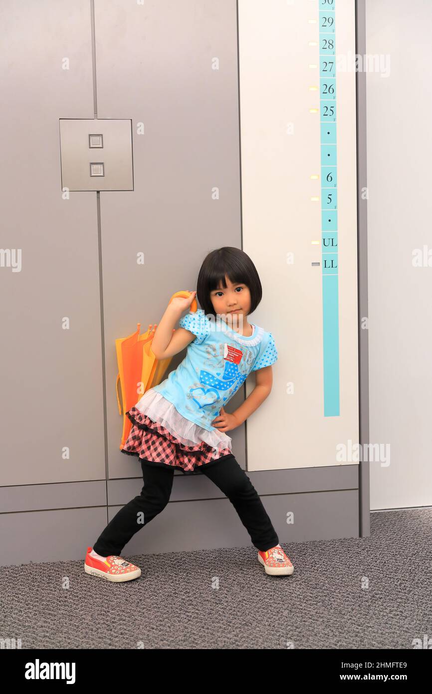 Child Youtuber in Front of Elevator at 29th Floor Youtube Space Tokyo Roppongi Japan. Stock Photo