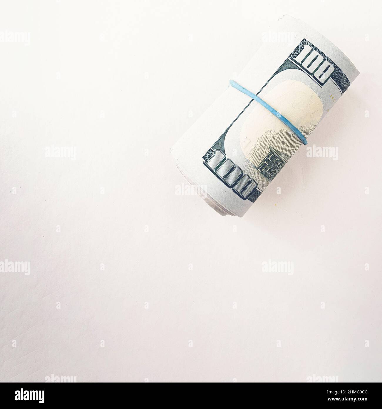 International money dollar bills, twisted rubber bands Stock Photo Alamy