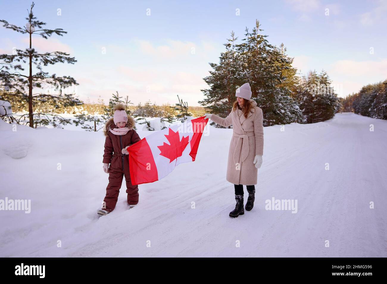 mother and daughter with the flag of Canada Stock Photo
