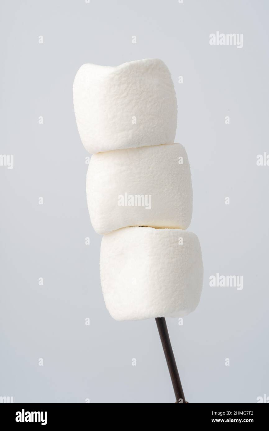 White marshmallows isolated on white background Stock Photo - Alamy