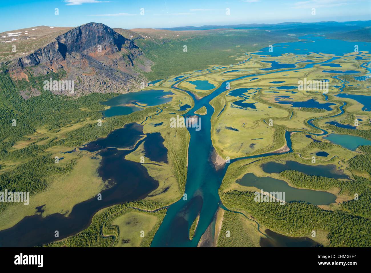 View from a helicopter over Laitaure delta taken in the summer with nice sunny wather and Mount Skerfe in the photo, Jokkmokk county, Swedish Lapland, Stock Photo