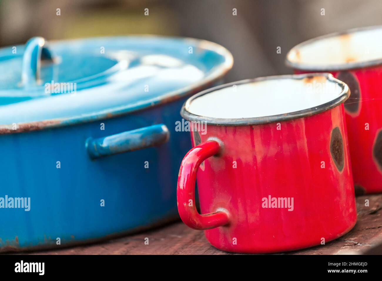 Ancient enamelled rusty pots Stock Photo Alamy
