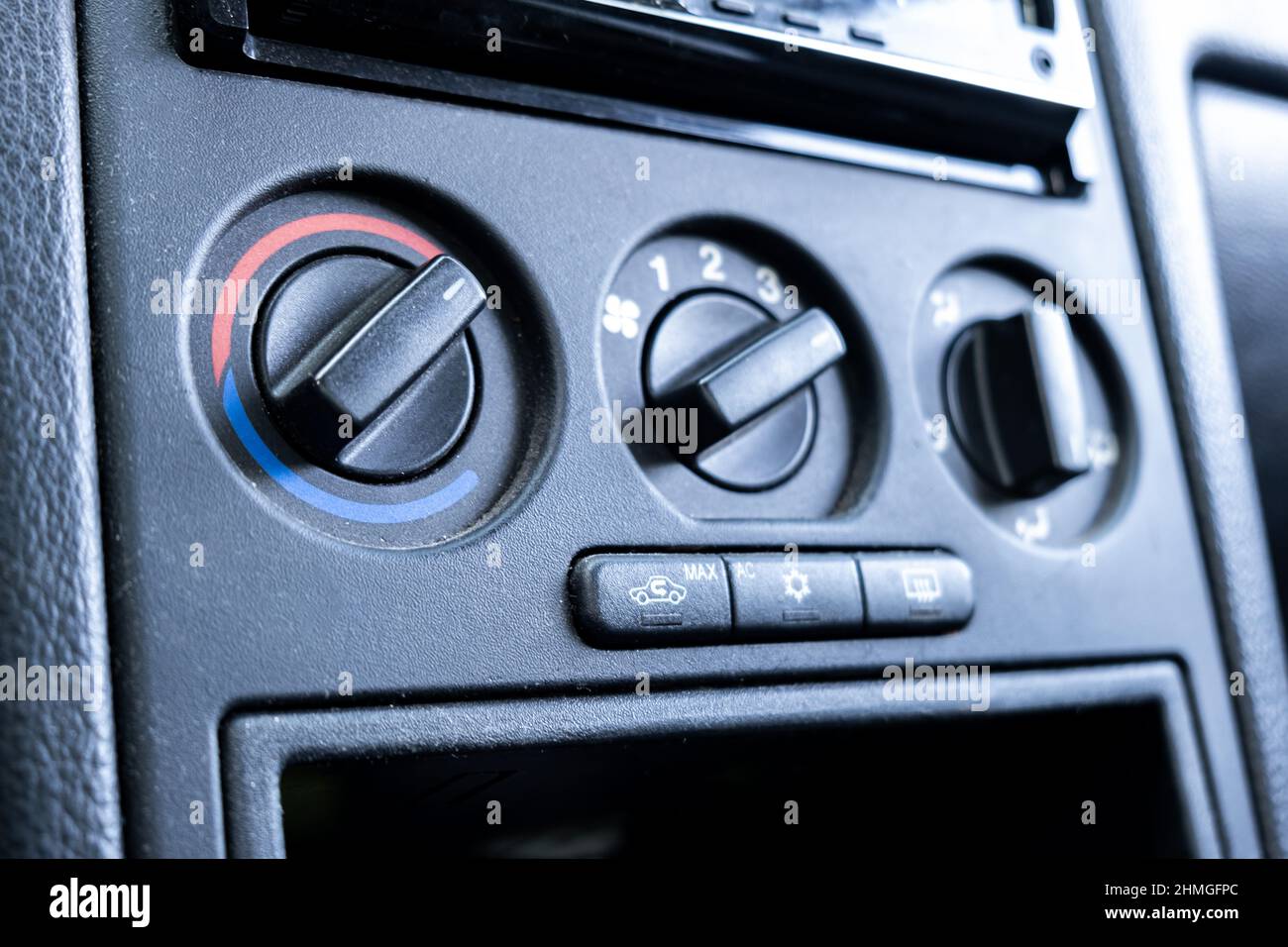 Mechanical control panel for car fan heating, air conditioning. Stock Photo