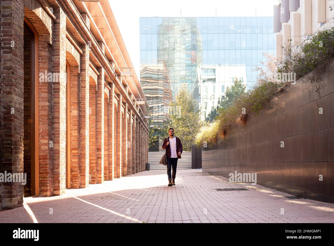Walking with a shoulder bag hi-res stock photography and images - Alamy