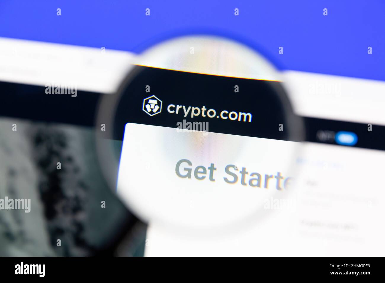 Ostersund, Sweden - Jan 20, 2022: Crypto.com  website under a magnifying glass. Crypto.com is a cryptocurrency exchange app based in Singapore. Stock Photo
