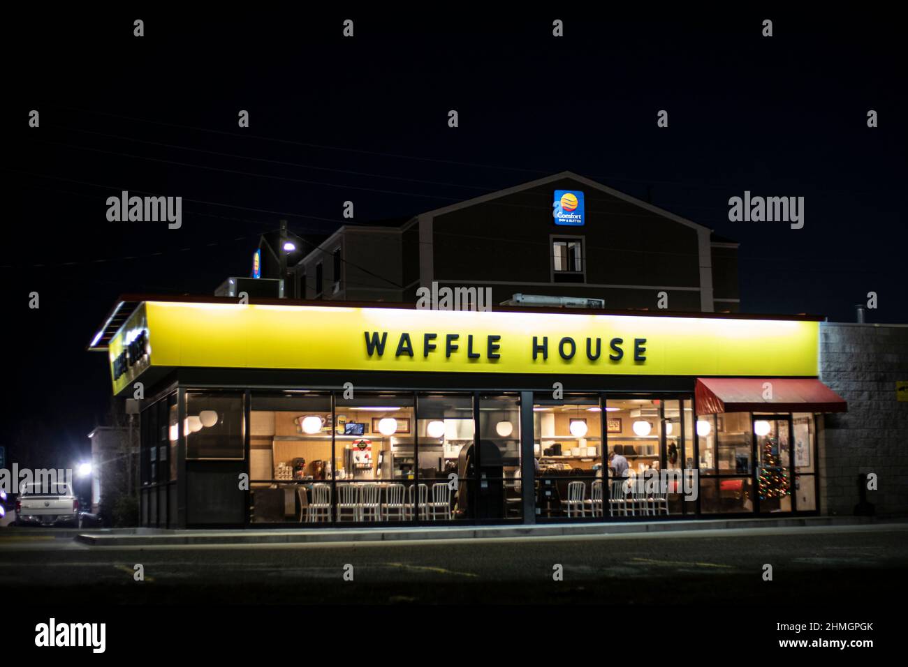 Augusta, Ga USA - 12 22 20: Waffle House restaurant at night people inside Belair road Stock Photo