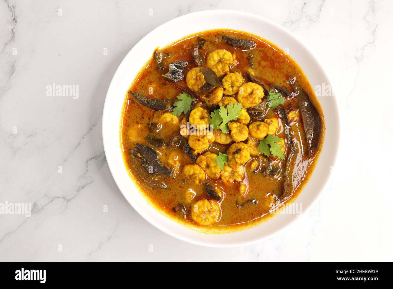 Tangy and spicy Shrimp curry. Tiny prawns curry made using dried mango