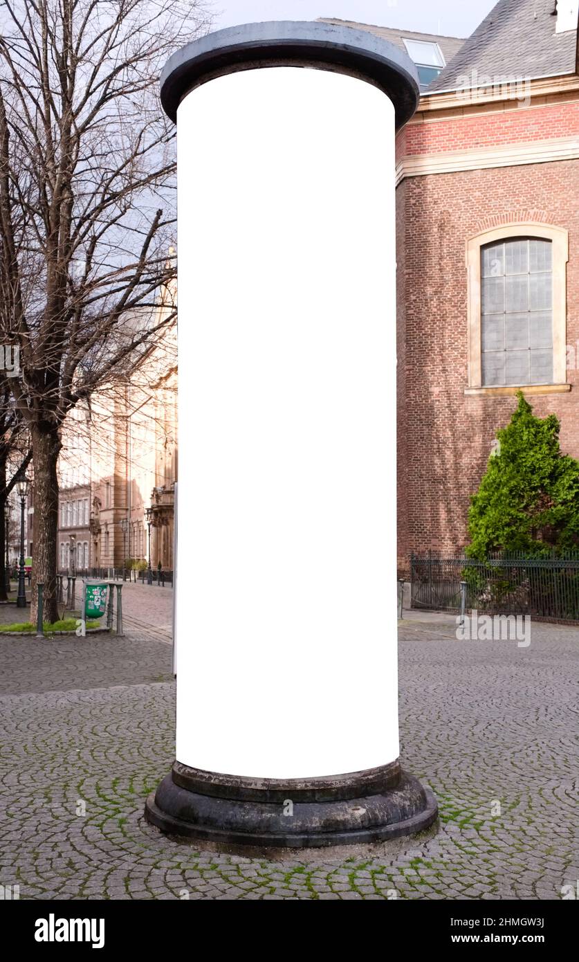 empty advertising pillar in an ancient city with free copy space, promotion mockup Stock Photo
