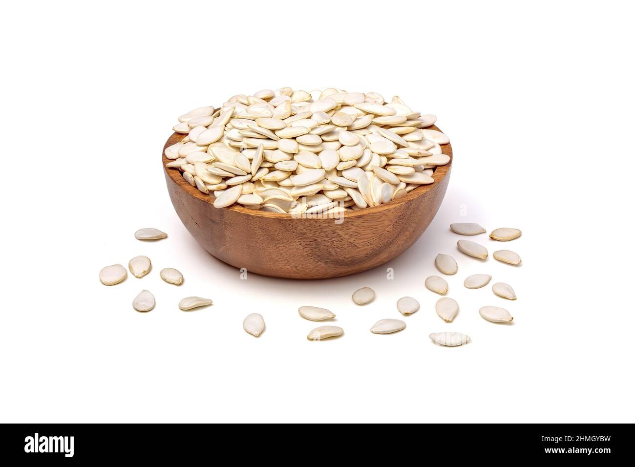 Pumpkin seeds in shell isolated on white background. Unpeeled pumpkin