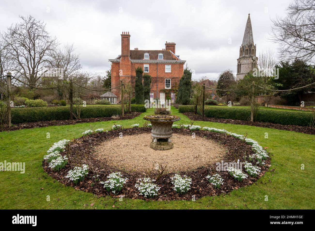 Welford Park garden and house with snowdrops, a popular visitor attraction during February in West Berkshire, England, UK Stock Photo