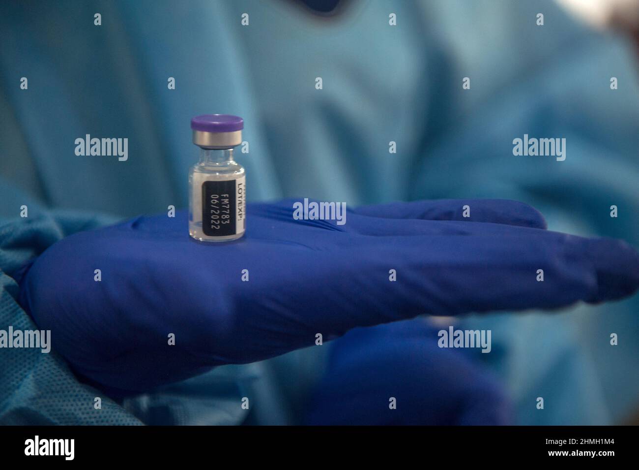 The COVID-19 booster vaccination process is seen in progress for the ...