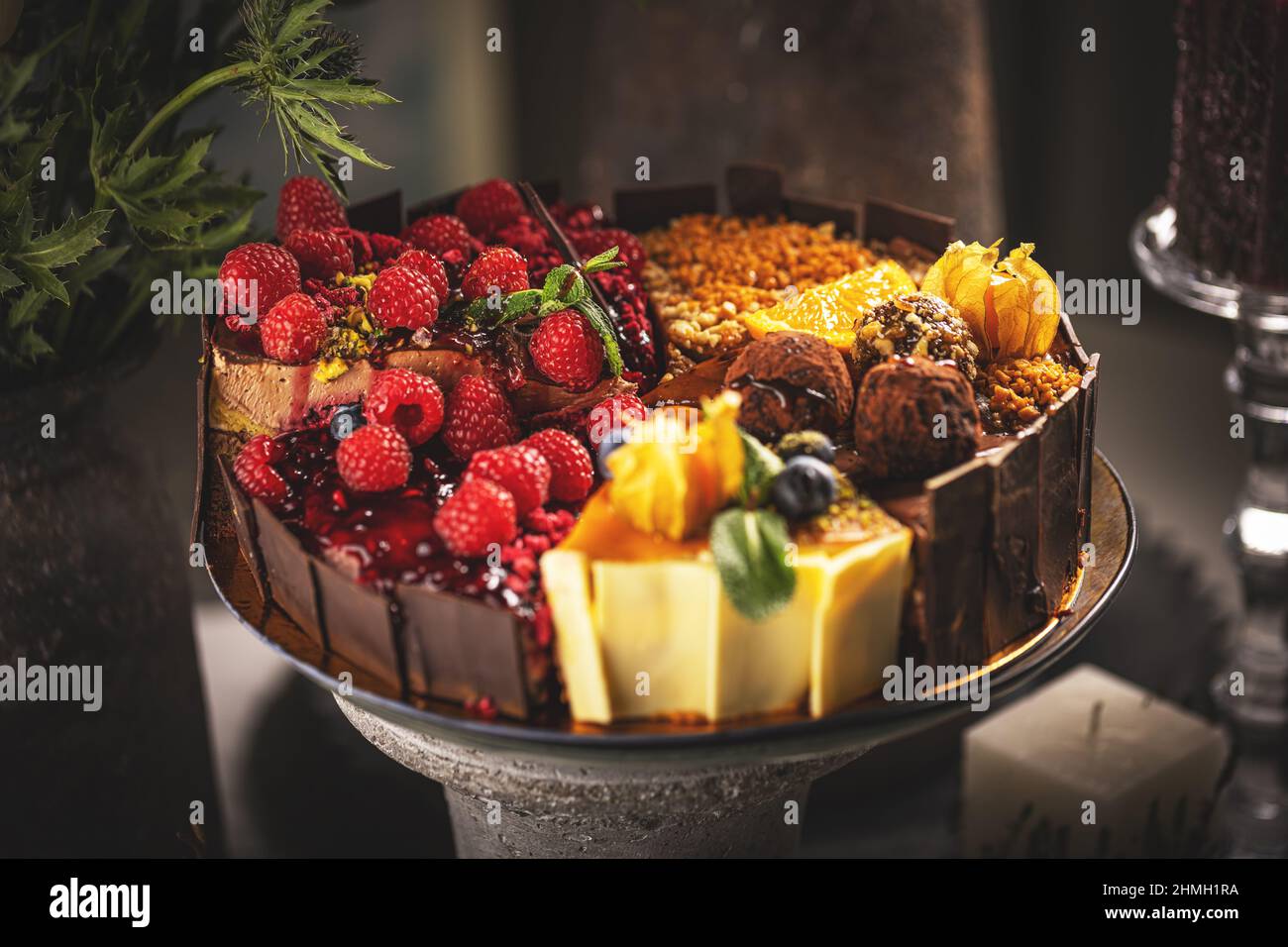 Different slices of various cakes, making a single whole torte Stock Photo