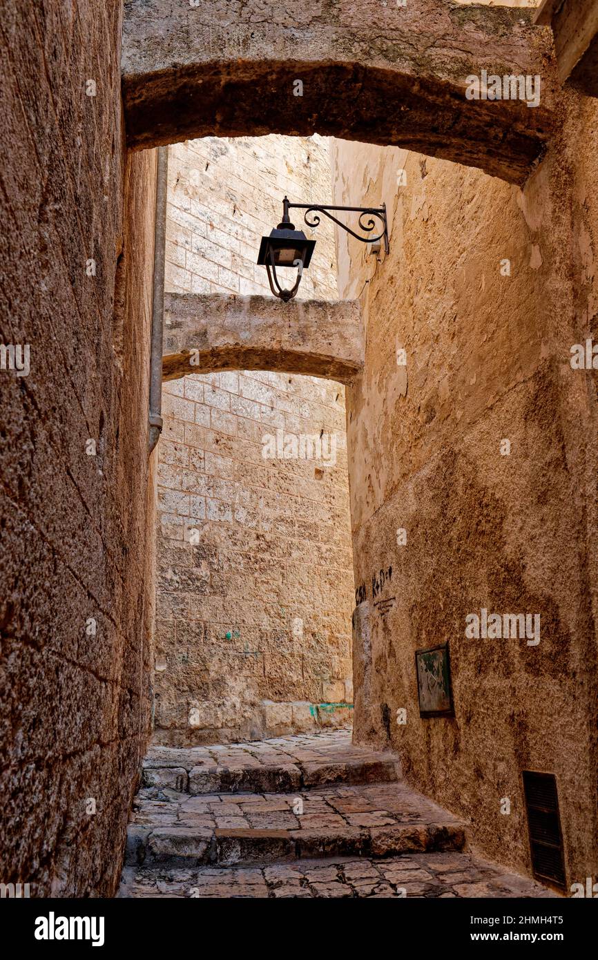 Archways and street lamp in the old town of Monopoli, Puglia, Italy Stock Photo