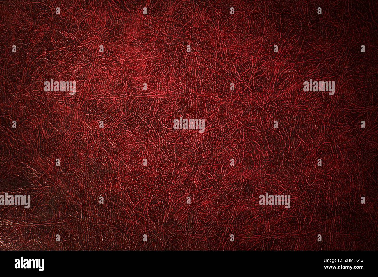 Texture, background from genuine red leather with vignette Stock Photo