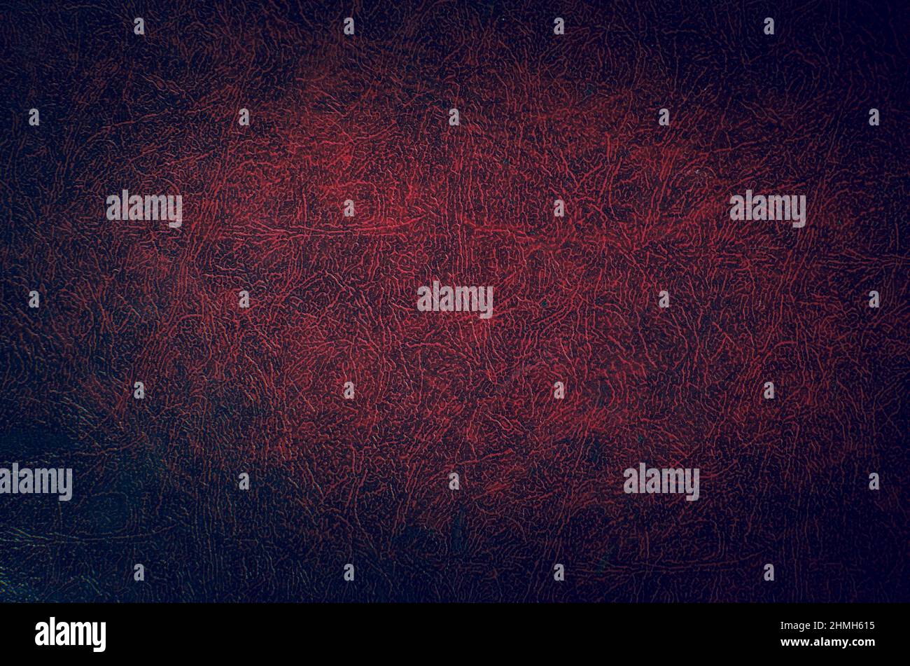 Texture, background from genuine red leather with vignette Stock Photo