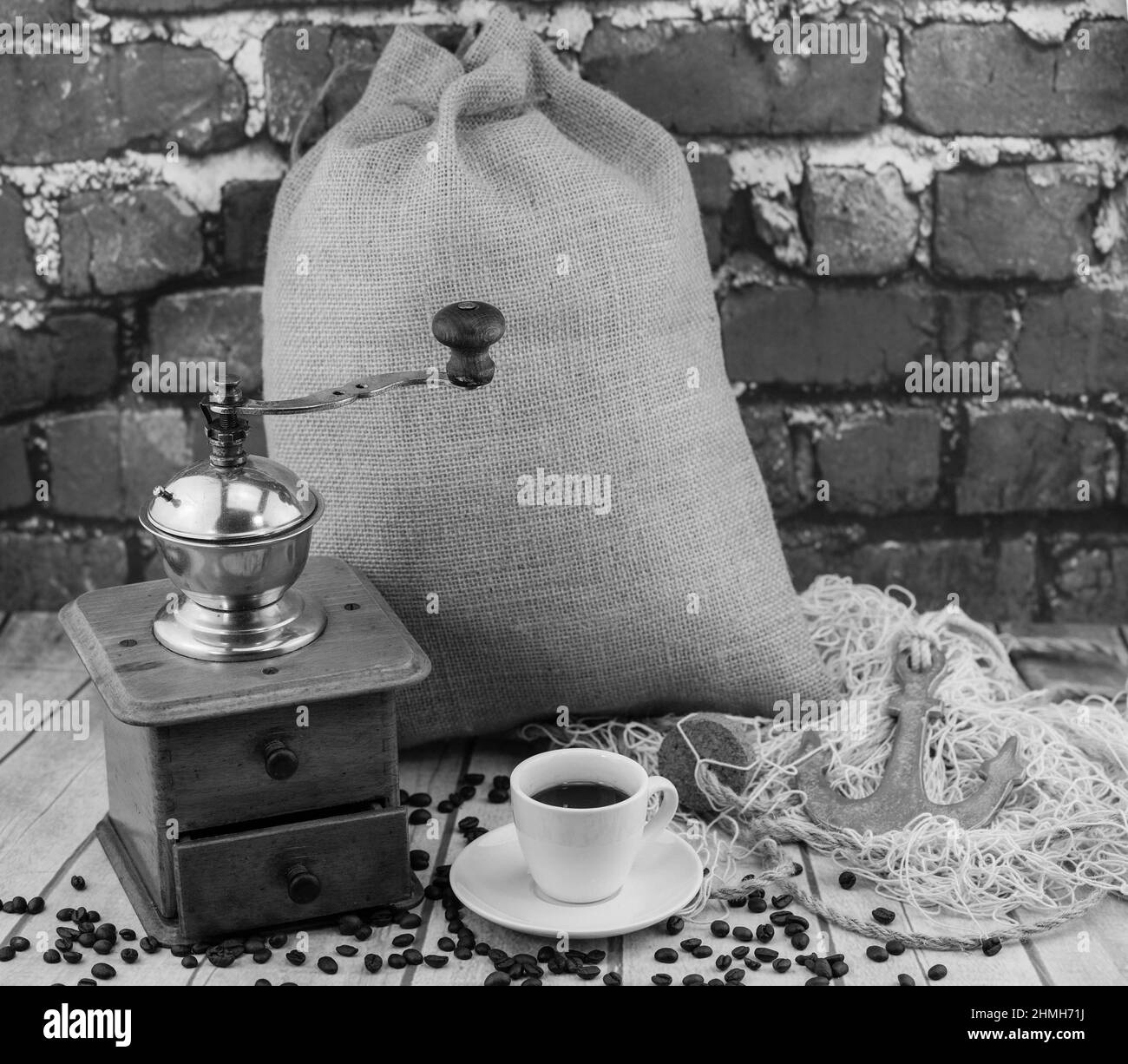roasted Coffee beans and a vintage coffee grinder Stock Photo Alamy