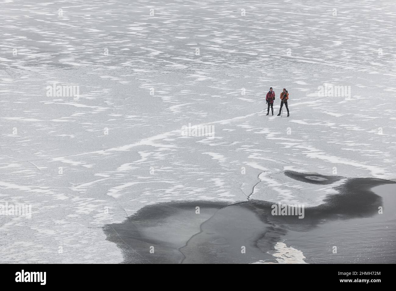 Skating on a frozen lake Stock Photo - Alamy