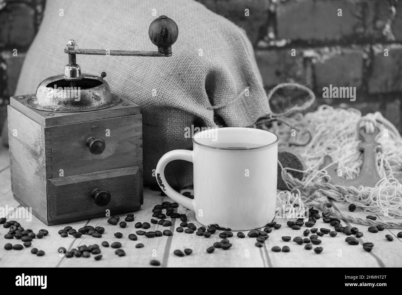roasted Coffee beans and a vintage coffee grinder Stock Photo Alamy