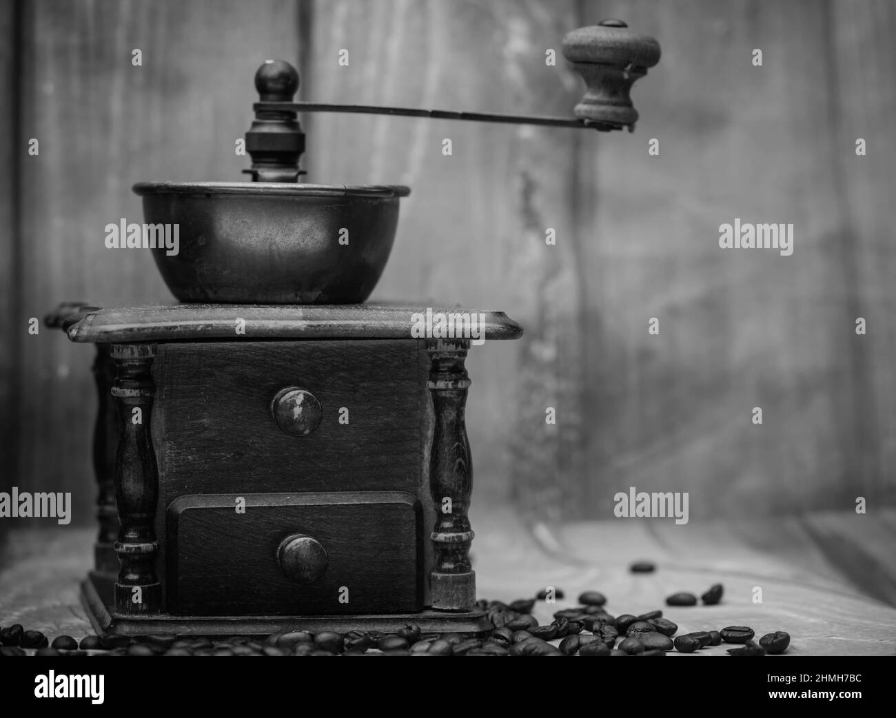 roasted Coffee beans and a vintage coffee grinder Stock Photo Alamy
