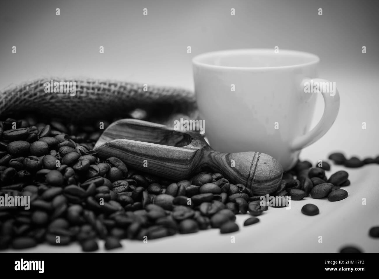 roasted Coffee beans and a vintage coffee grinder Stock Photo Alamy