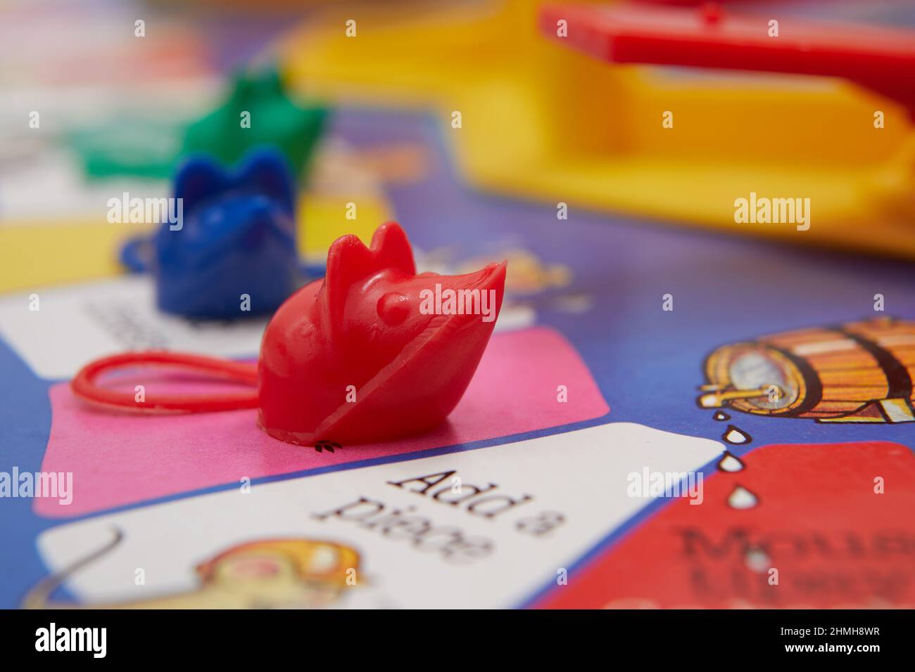https://c8.alamy.com/comp/2HMH8WR/close-up-photograph-of-playing-pieces-on-a-mouse-trap-board-game-2HMH8WR.jpg