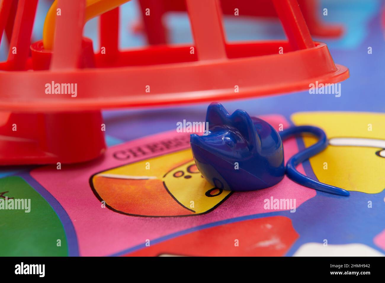 https://c8.alamy.com/comp/2HMH942/close-up-photograph-of-playing-pieces-on-a-mouse-trap-board-game-2HMH942.jpg