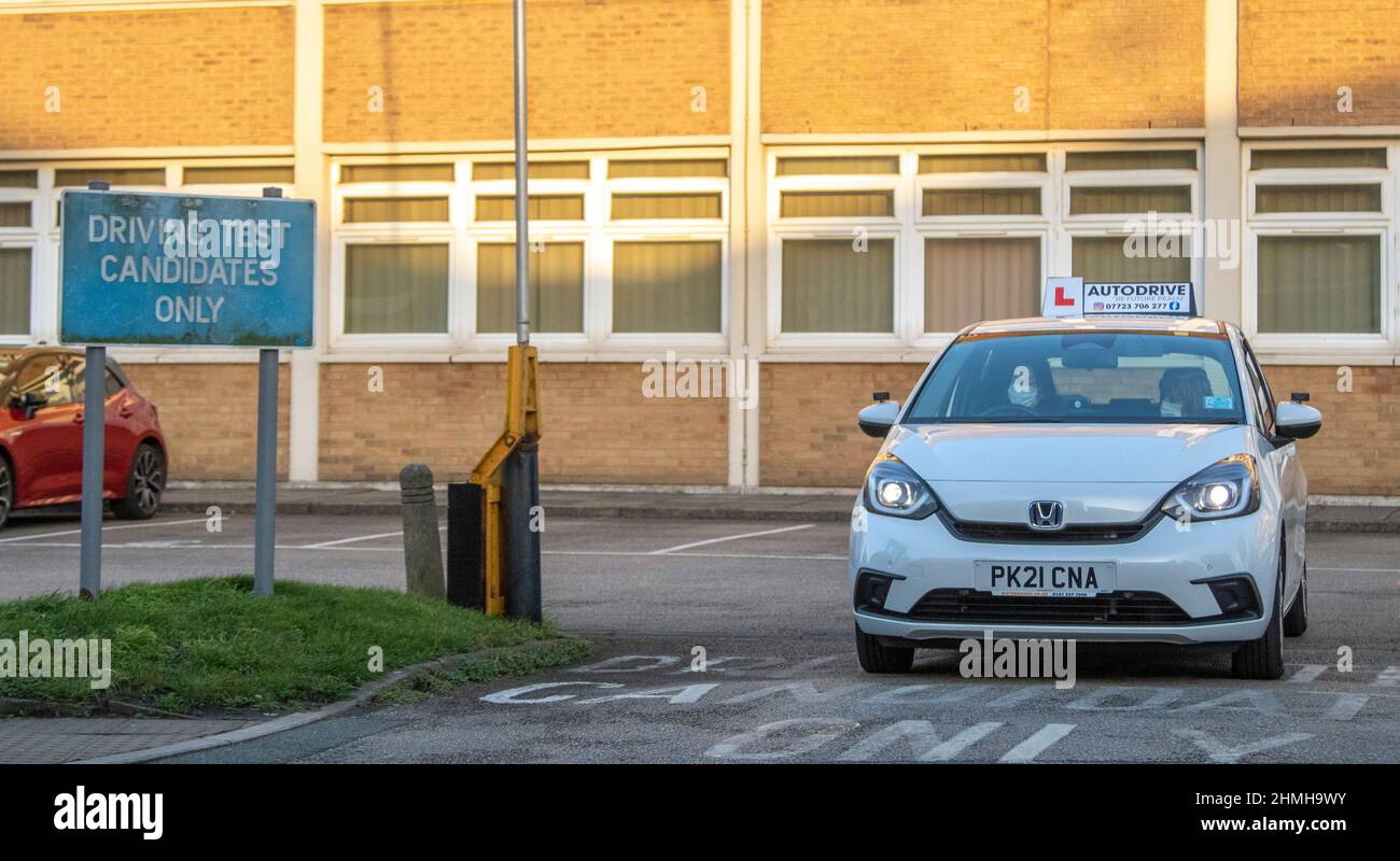 DVSA Driving Test Candidates Only sign,  Honda Jazz SR I-MMD CVT SE car learner drivers taking their proficiency test in Southport, Merseyside, UK Stock Photo