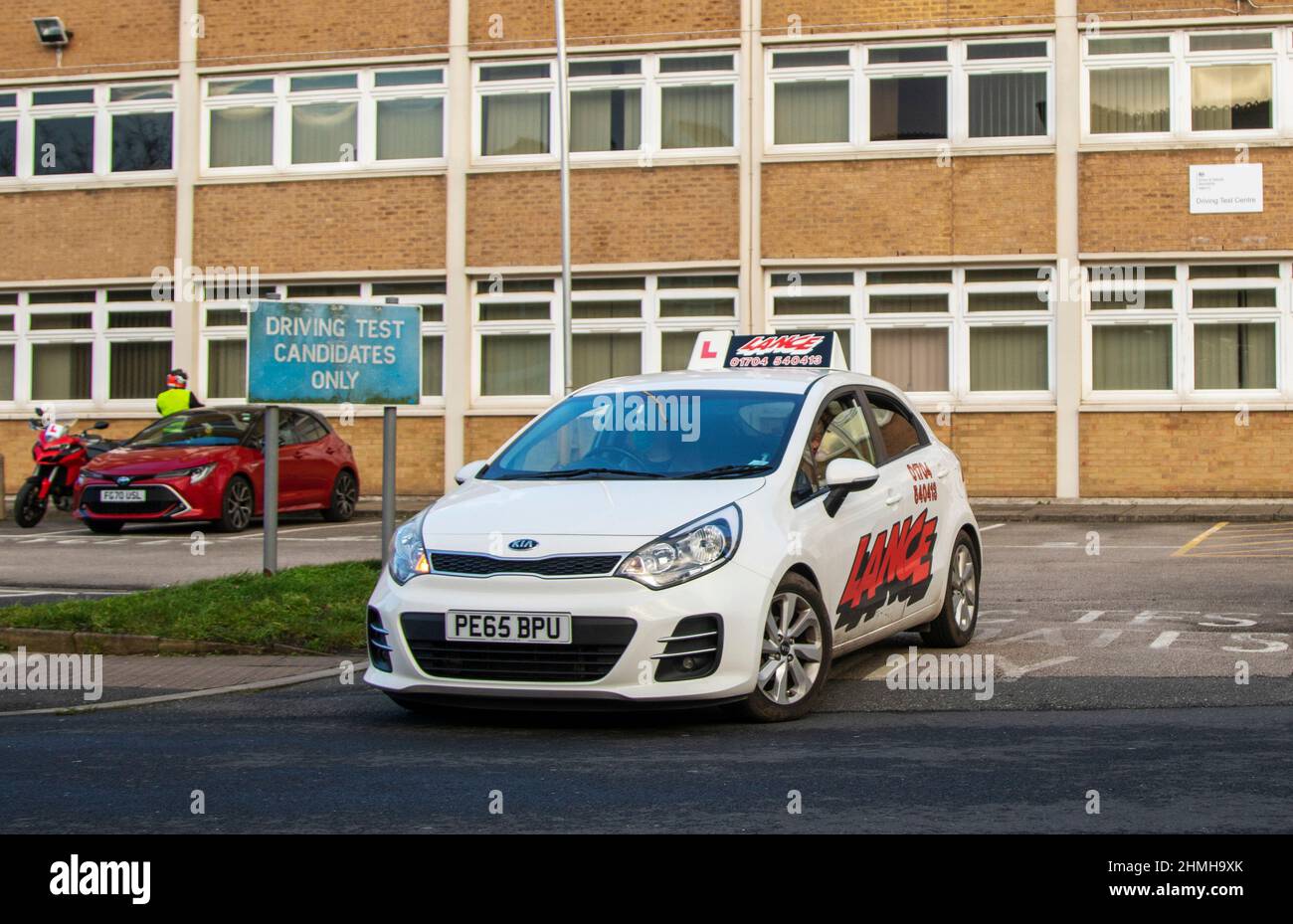 DVSA Driving Test Candidates Only sign, Kia Rio Crdi SR7 ISG 6 speed manual car learner drivers taking their proficiency test in Southport, Merseyside, UK Stock Photo