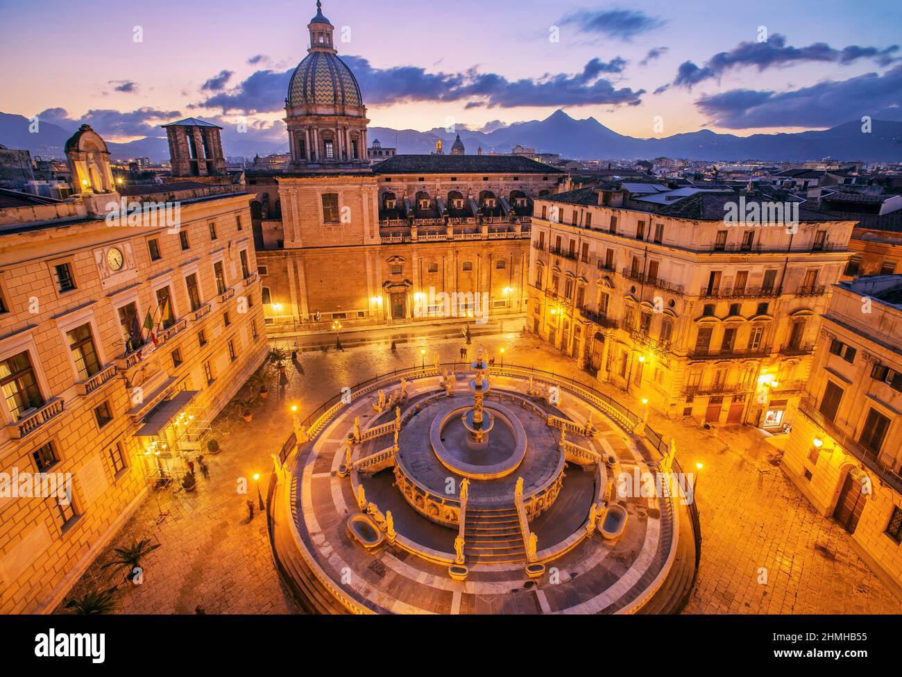 Piazza Pretoria with the Fontana Pretoria and the Church of San Giuseppe dei Teatini in the old town at dusk, Palermo, Sicily, Italy Stock Photo